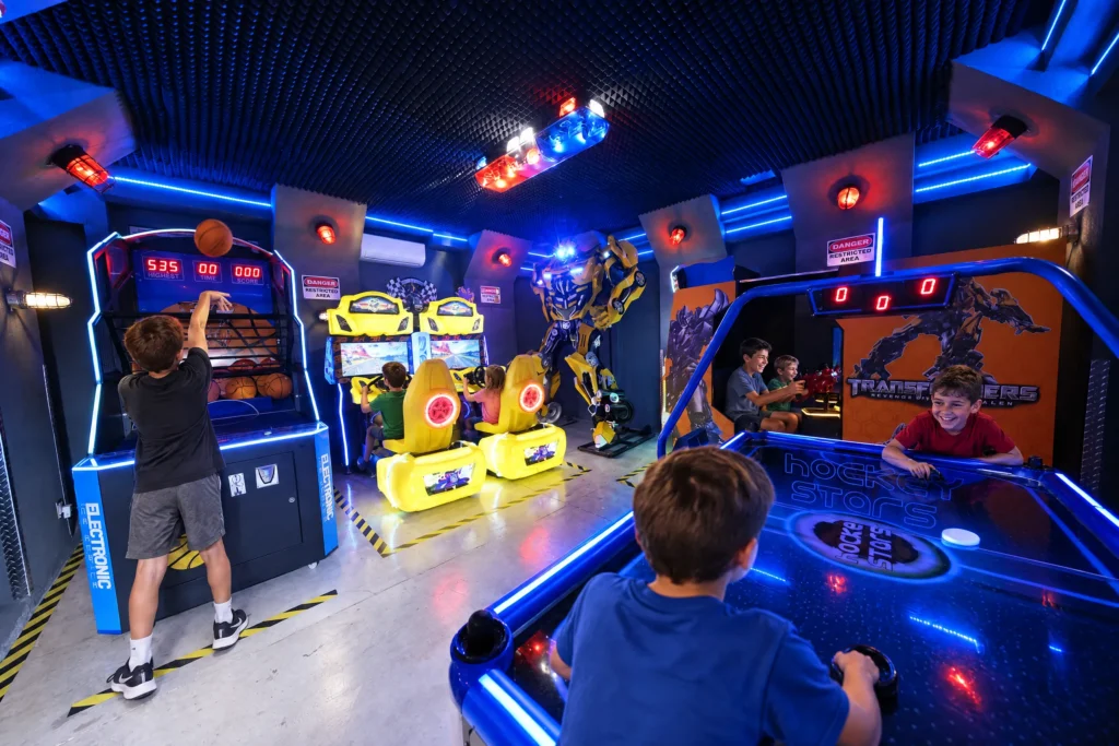 Cousins play every station in the Robot Game Room at The Electronic Ice Castle