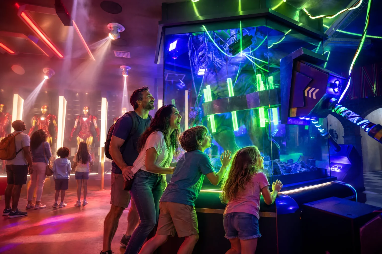 Kids press up to the glowing glass case in Tony's Lab